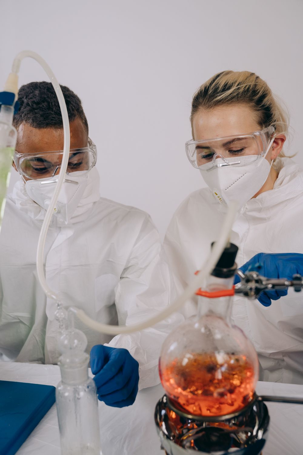 Engineers performing chemical testing in a lab